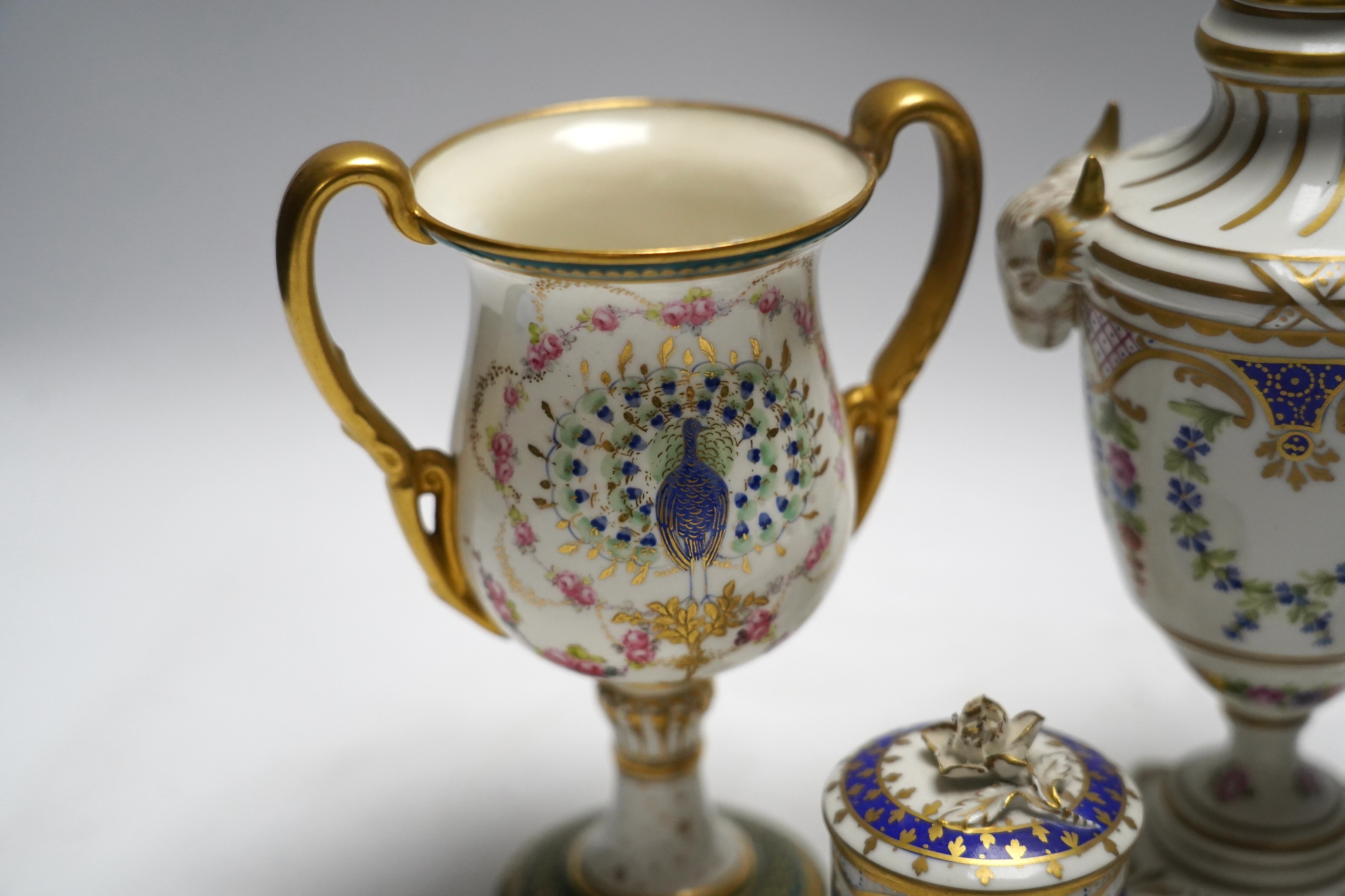 Three pairs of Dresden decorative porcelain items and a pair of Royal Crown Derby ‘Peacock’ urns, tallest 20cm (8)